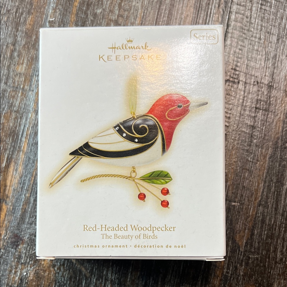 2009 Hallmark Red and Black Woodpecker Ornament. Fifth in the Series. New in Box